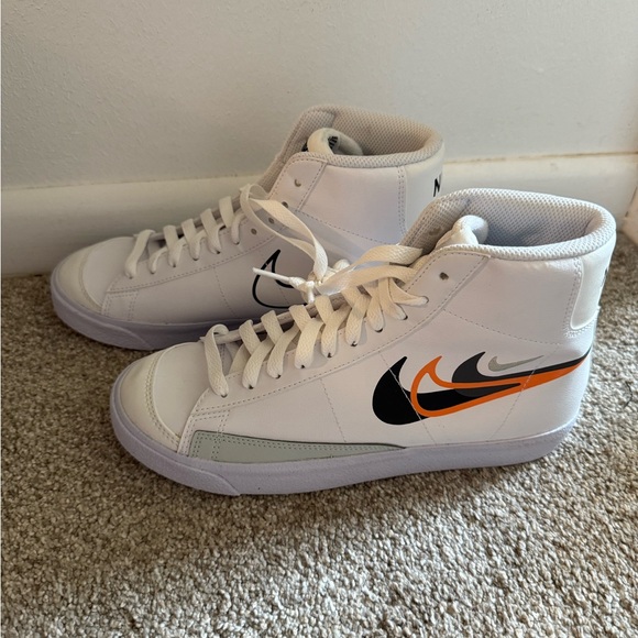 NikeWhite and Black High-Top Sneakers